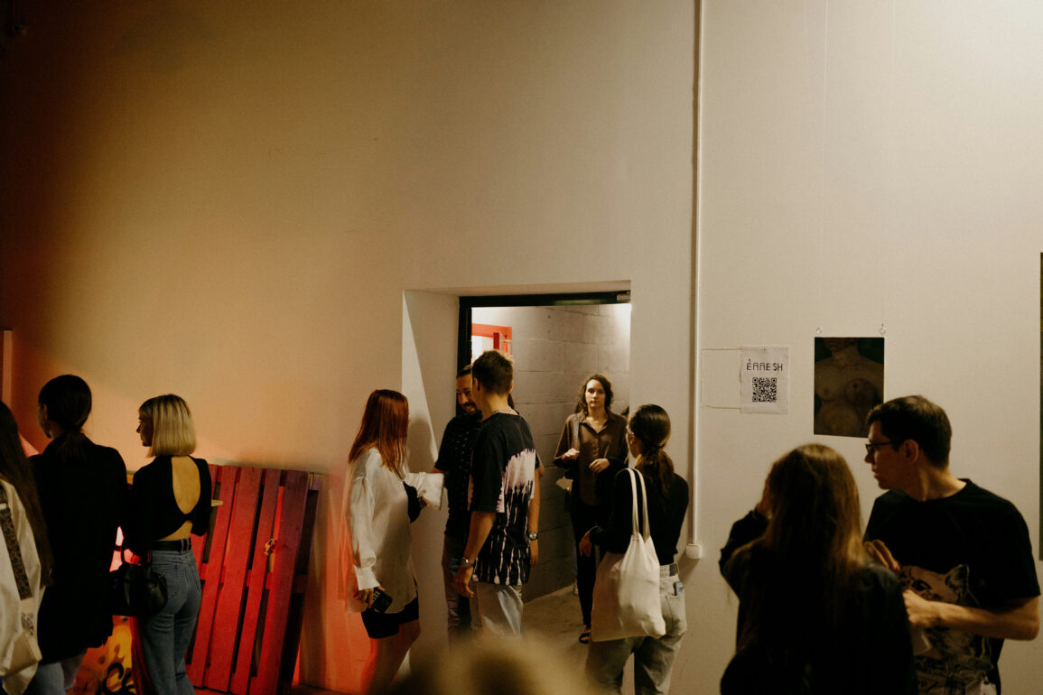 Visitors exploring a contemporary art space.
