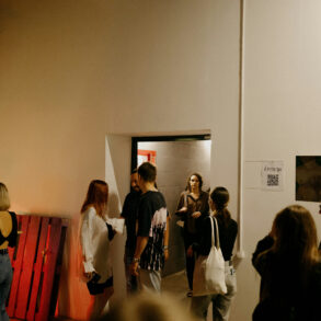 Visitors exploring a contemporary art space.