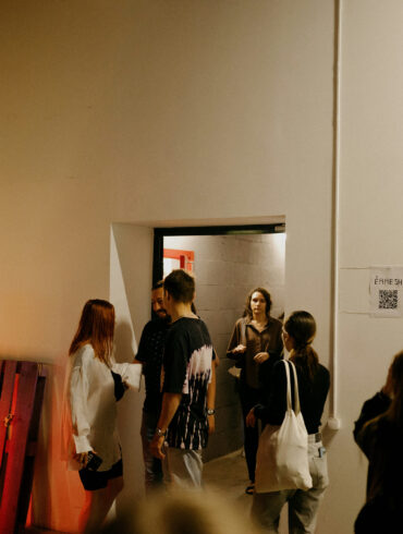 Visitors exploring a contemporary art space.