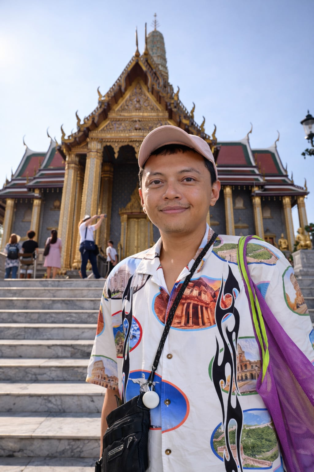 Singaporean Muslim artist Reza Hasni standing in front of a temple.
