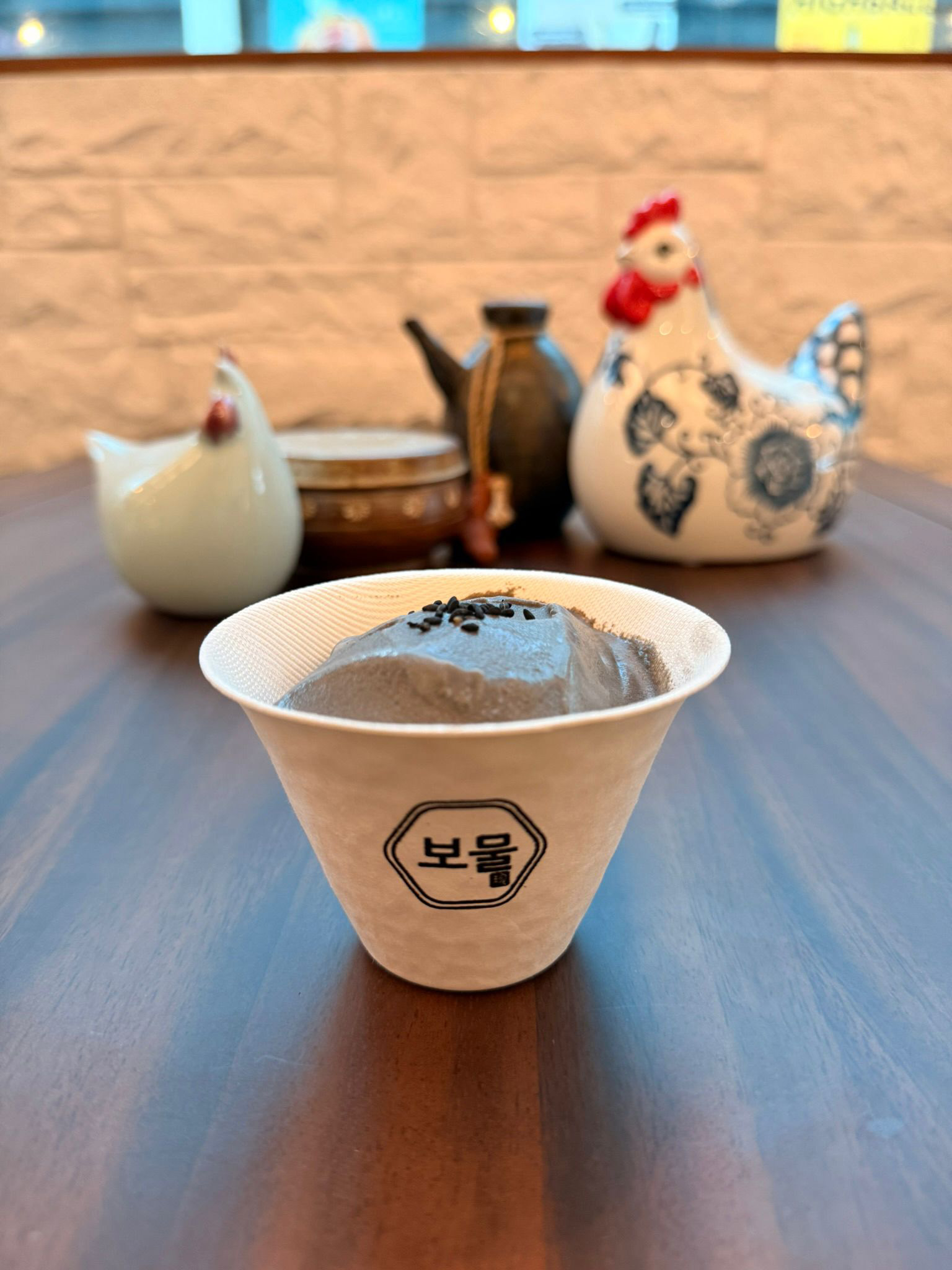 Black sesame gelato in a cup at BOMUL Gelato Bar, CHIJMES Singapore