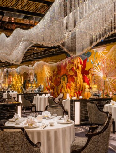 Palace Garden restaurant interior at Grand Lisboa Palace Macau with floral mural and chandelier