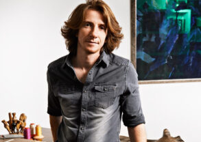 A photo of Robert Mercier, leather fashion designer at his artisan workshop.