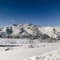Snow-covered mountains and townscape of Yuzawa Onsen in Niigata, Japan’s Snow Country near Tokyo.