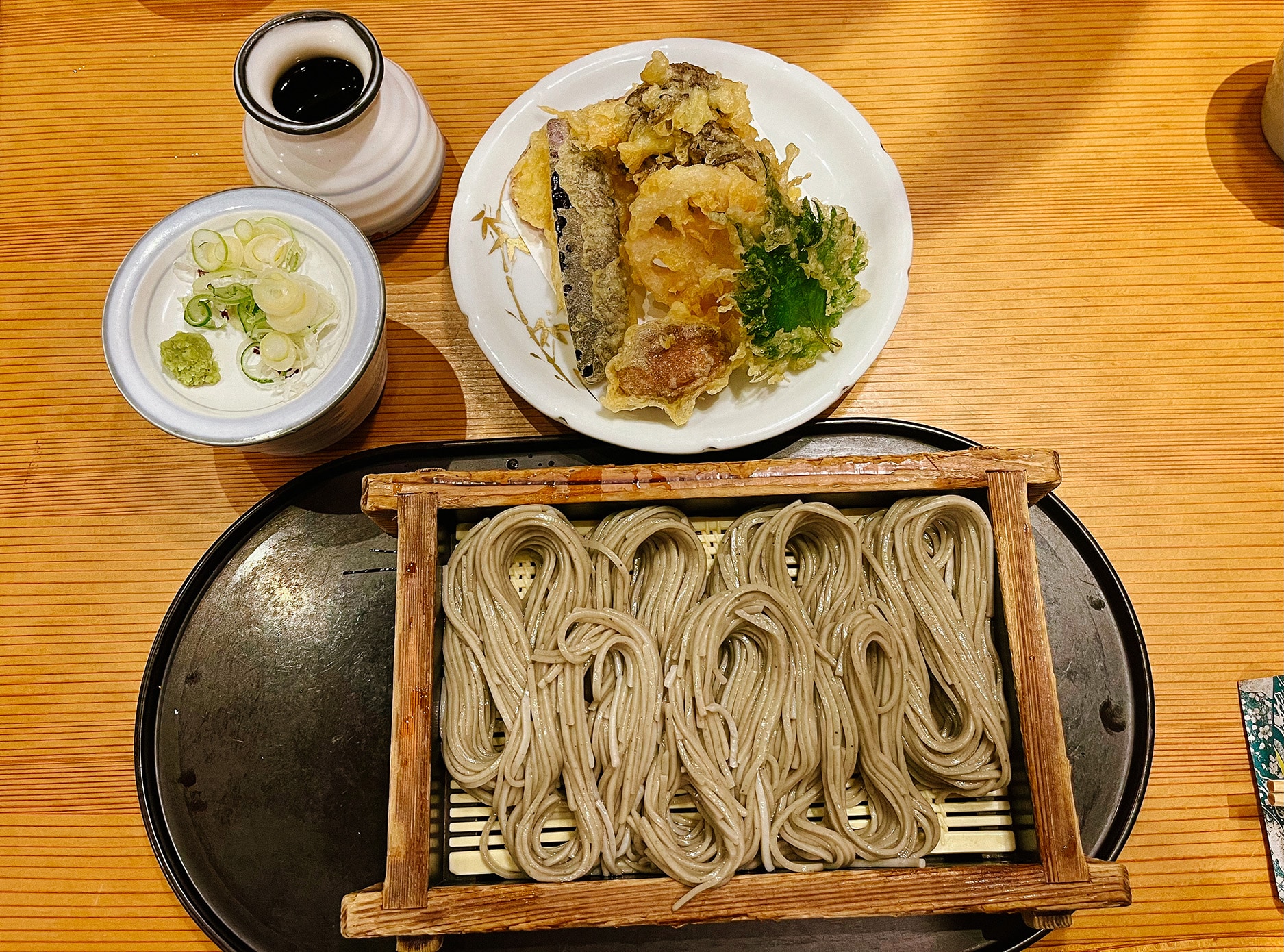Bowl of ramen served with sake in Yuzawa Onsen, Niigata, a region famous for food and sake.