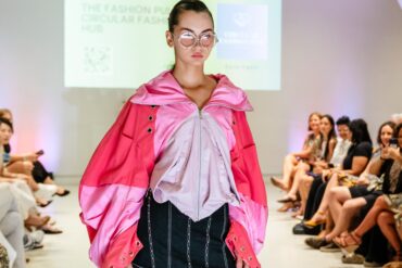 Model walking the runway for a sustainable fashion showcase at Eco Fashion Weekend Singapore 2025.