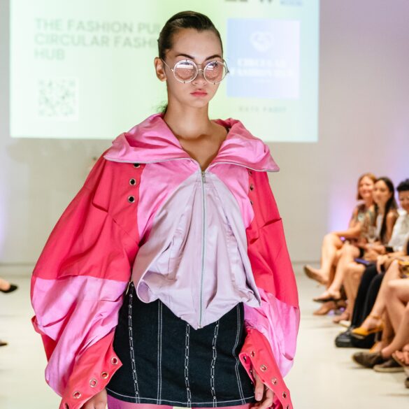 Model walking the runway for a sustainable fashion showcase at Eco Fashion Weekend Singapore 2025.