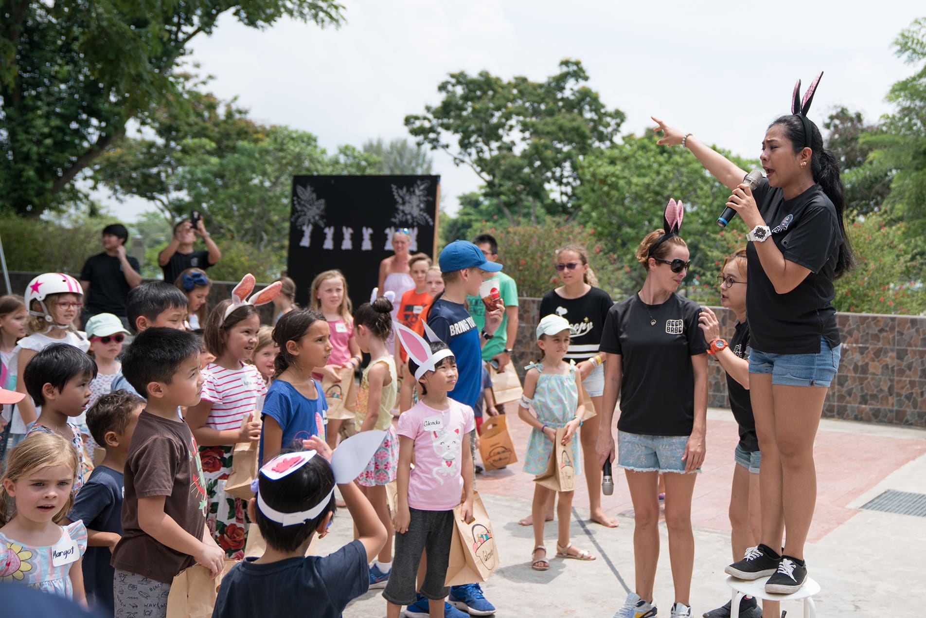 Children participating in an Easter egg hunt event at Little Island Brewing Co during a family-friendly Easter celebration.