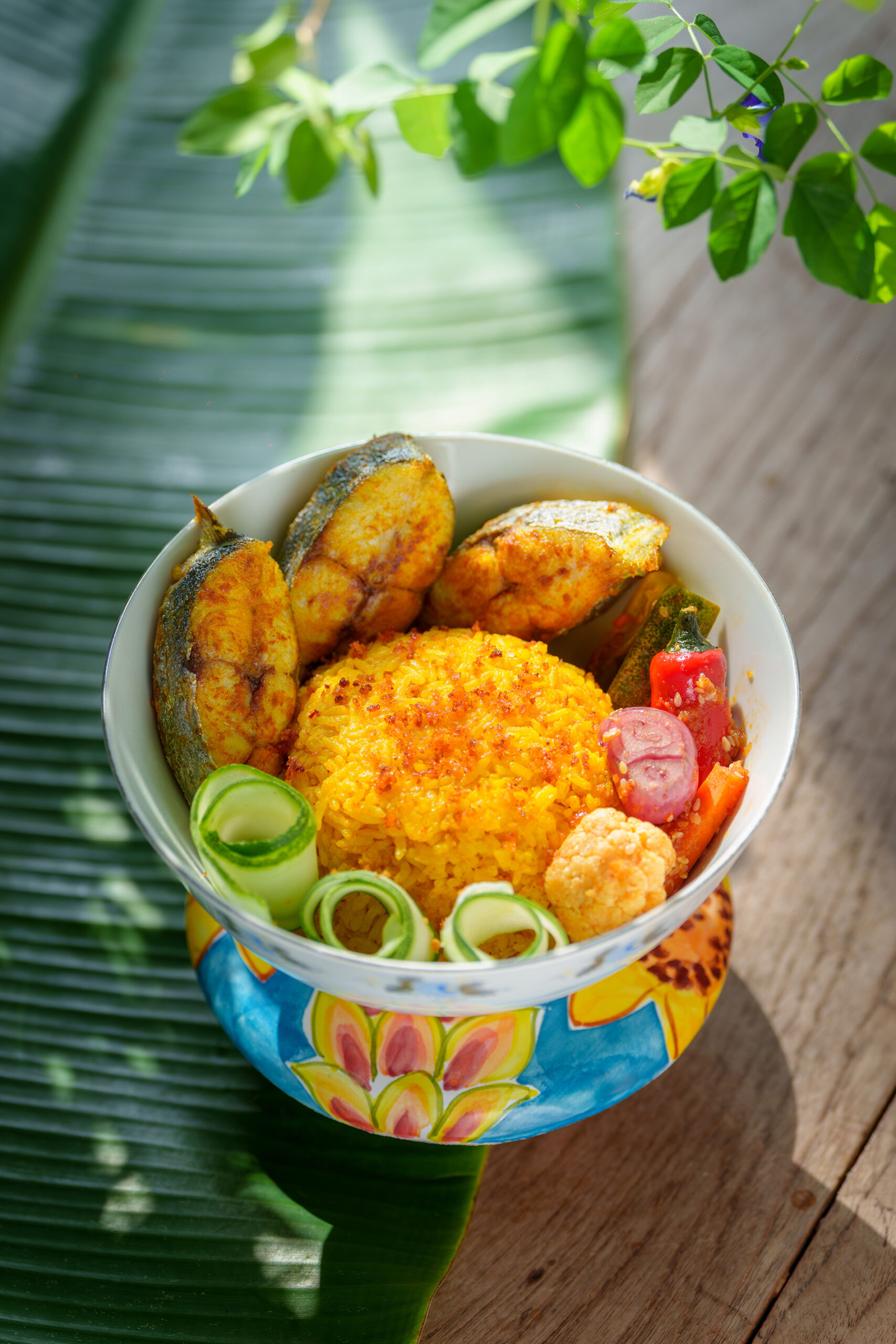 Turmeric fish grain bowl with spiced rice and vegetables at Nonyanita Café pop-up in Singapore