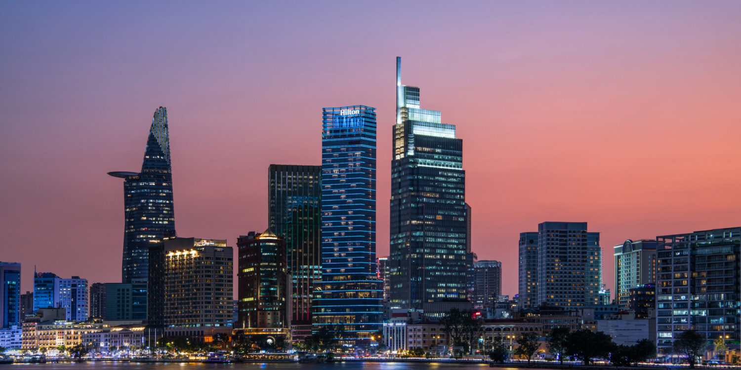Hilton Saigon skyline at sunset overlooking the Saigon River in Ho Chi Minh City
