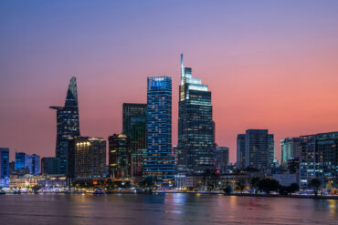 Hilton Saigon skyline at sunset overlooking the Saigon River in Ho Chi Minh City