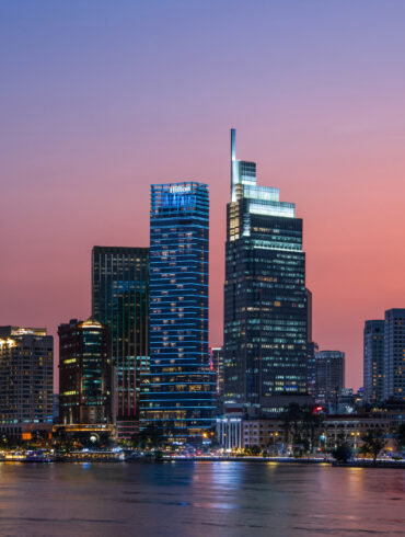 Hilton Saigon skyline at sunset overlooking the Saigon River in Ho Chi Minh City