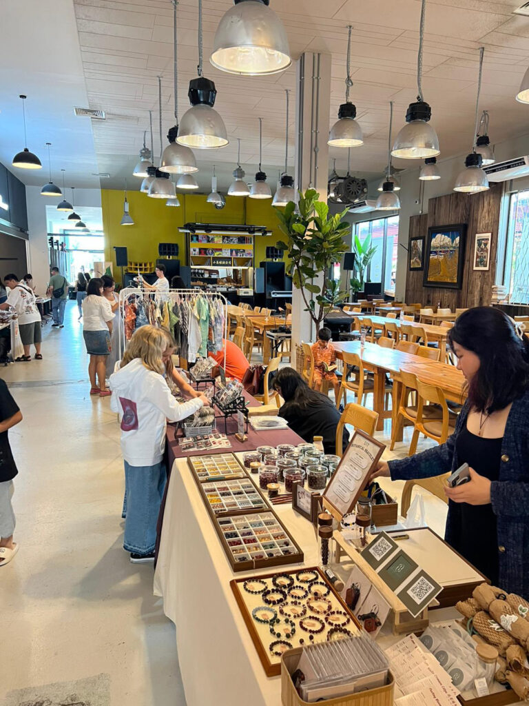 Shoppers browsing handmade jewellery, accessories and artisan goods at Little Island Brewing Co.'s indoor craft market, Singapore