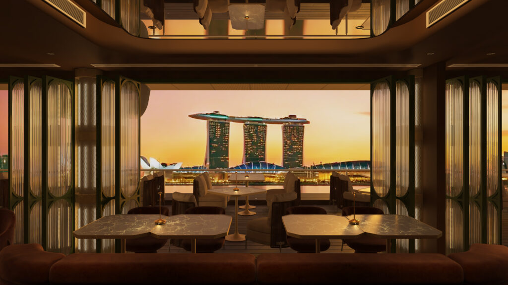 The view from Milli: Sky Dining & Bar at sunset, with Marina Bay Sands framed through the rooftop's windows and intimate seating arrangements set against the warm dusk sky.