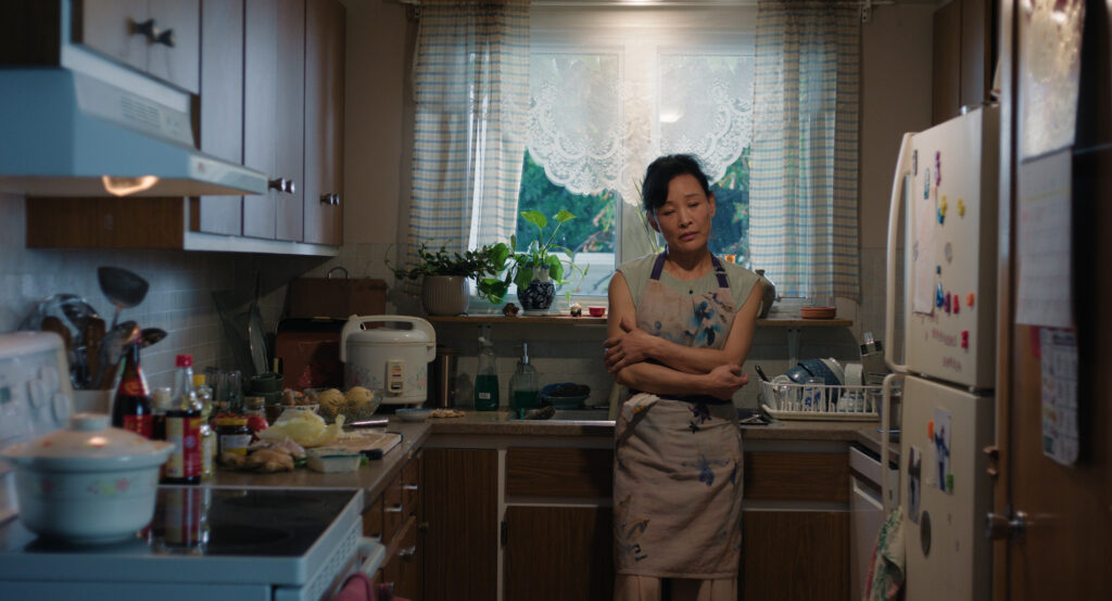 Joan Chen as Feng Xia in a kitchen scene from Montréal, My Beautiful, screening at Filmhouse Singapore for Pink Screen 2026