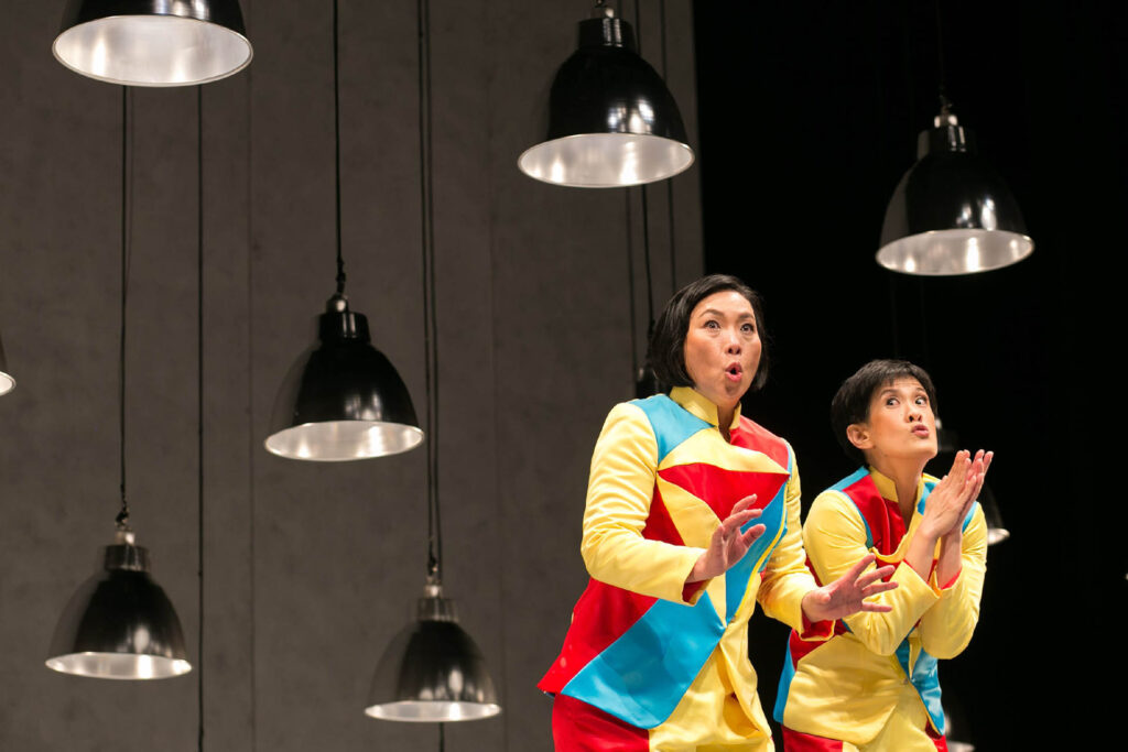Checkpoint Theatre Singapore production with two performers in colourful costumes on stage