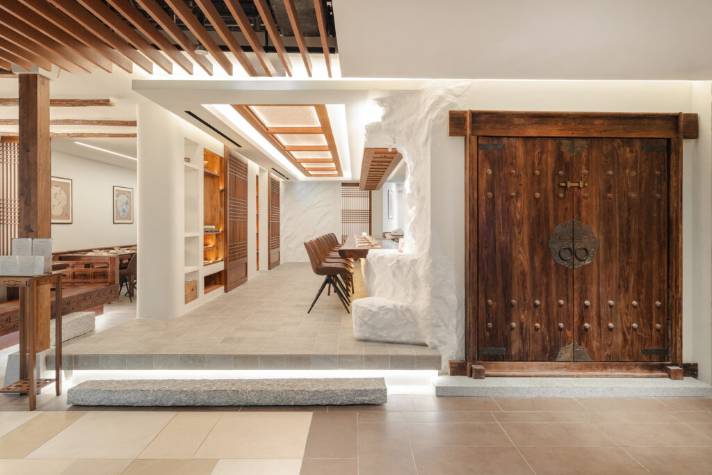 Hanok-style dining room with wooden doors at Modu, a Korean fine dining restaurant in Singapore