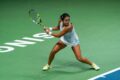 Alexandra Eala stretches for a backhand return during a match, credit: The Kallang
