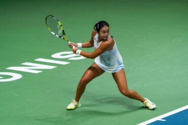 Alexandra Eala stretches for a backhand return during a match, credit: The Kallang