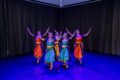 Bharatanatyam dancers in colourful costumes perform on stage at SIFAS Singapore Indian Fine Arts Society