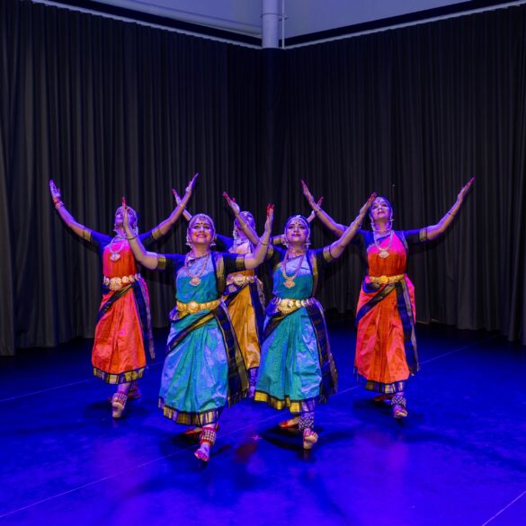 Bharatanatyam dancers in colourful costumes perform on stage at SIFAS Singapore Indian Fine Arts Society