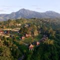 Aerial view of Bagus Agro Pelaga's highland eco-farm and thatched-roof villas in Bali, the venue for KAJE 2026.