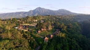 Aerial view of Bagus Agro Pelaga's highland eco-farm and thatched-roof villas in Bali, the venue for KAJE 2026.