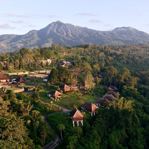 Aerial view of Bagus Agro Pelaga's highland eco-farm and thatched-roof villas in Bali, the venue for KAJE 2026.