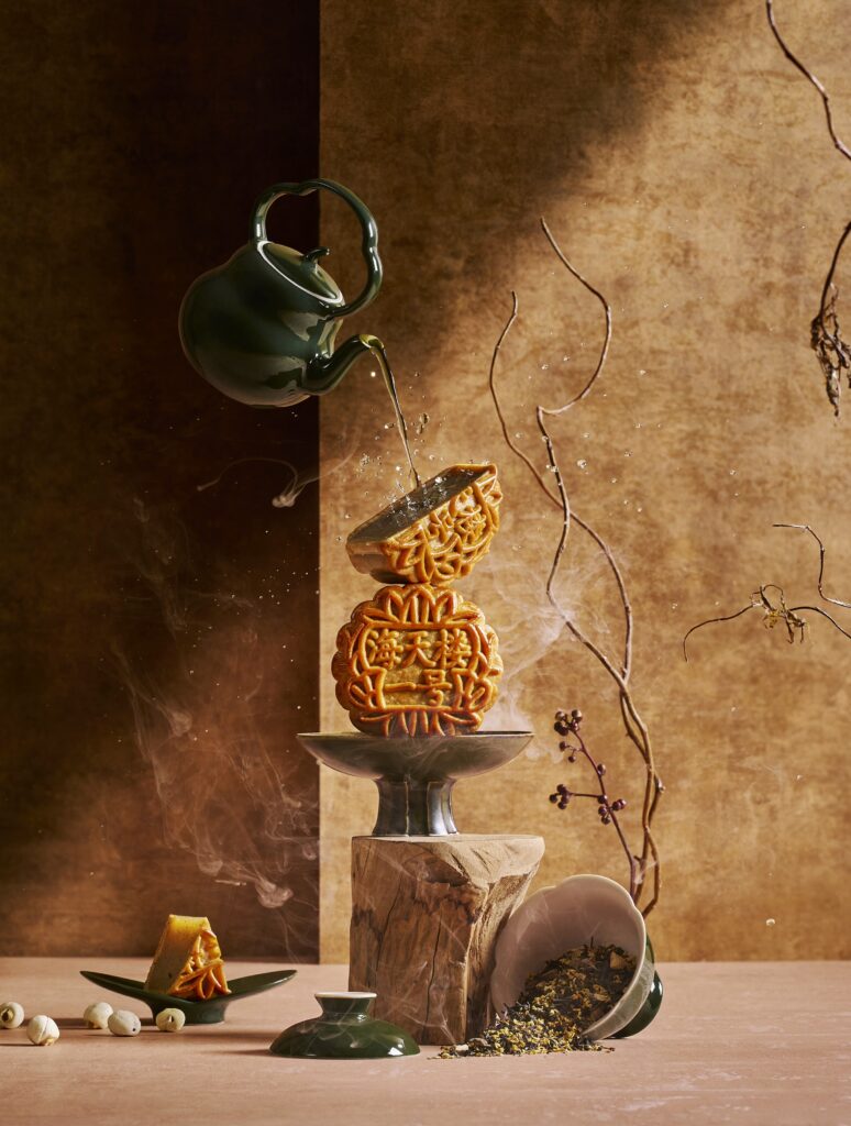 Hai Tien Lo No. 1 Tea Baked Mooncake with tea being poured over it, Pan Pacific Singapore Mid-Autumn 2026 collection