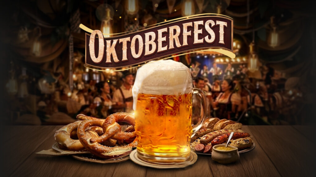 Oktoberfest promotional graphic featuring a frothy beer stein, pretzels, and bratwurst against a traditional Bavarian beer hall backdrop