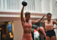 Two women compete in the outdoor run event at UFIT Games, Singapore's new partner-based fitness competition