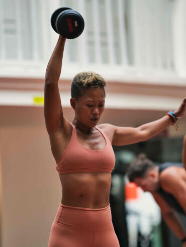 Two women compete in the outdoor run event at UFIT Games, Singapore's new partner-based fitness competition