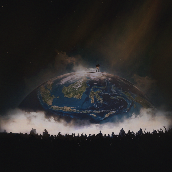 Silhouette of YE atop a glowing globe stage, with a crowd gathered below at YE Live in Jakarta 2026.