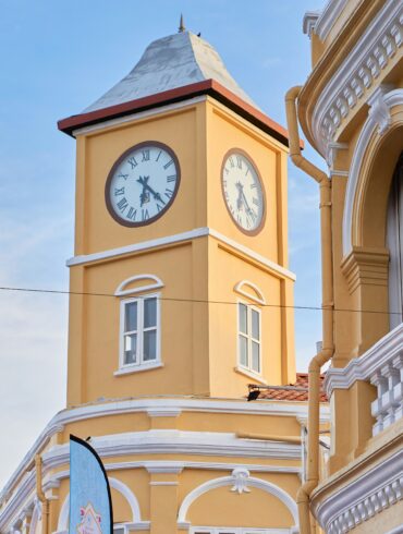 Museum Phuket yellow clock tower building in Phuket Old Town
