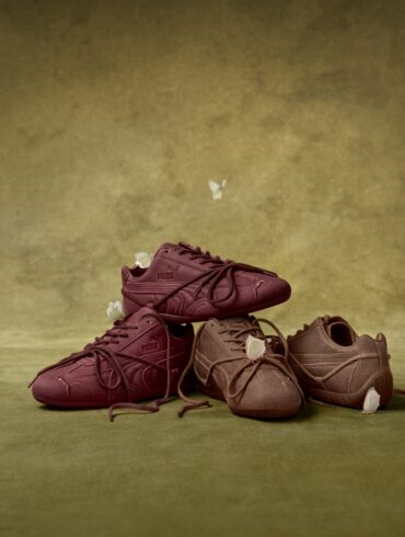 PUMA x ROSÉ Speedcat sneakers in burgundy and brown nubuck leather with wrapped laces, stacked on an olive green backdrop with white butterflies.