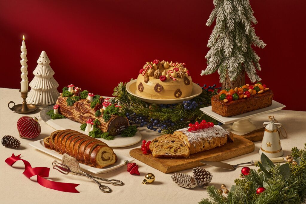 The Capitol Kempinski Hotel Singapore festive bakes, including the Chocolate Banana Hazelnut Yule Log, PB&J Christmas Wreath Cake, Traditional Beigli, stollen and Plantation 1840 Rum Fruitcake
