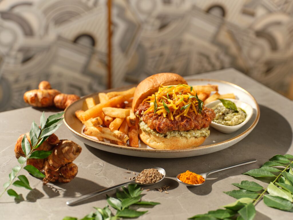 Filet-O-Kee's crisp cod burger with mango slaw, curry leaf and fries at Kee's Restaurant & Bar, 21 Carpenter Street.